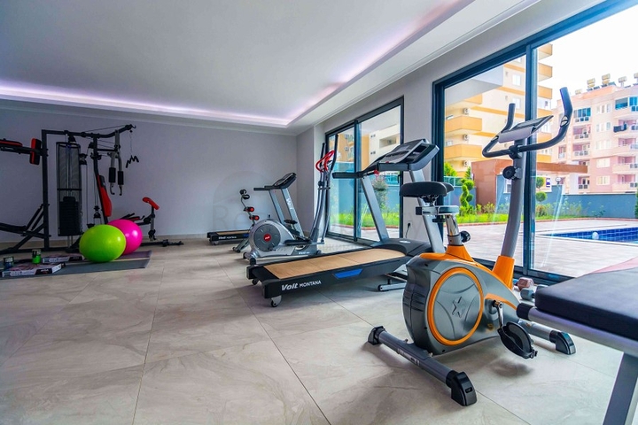 شقة للبيع في الانيا - تصميم انيق - 2 غرفة وصالة -في مهموتلار / الانيا 