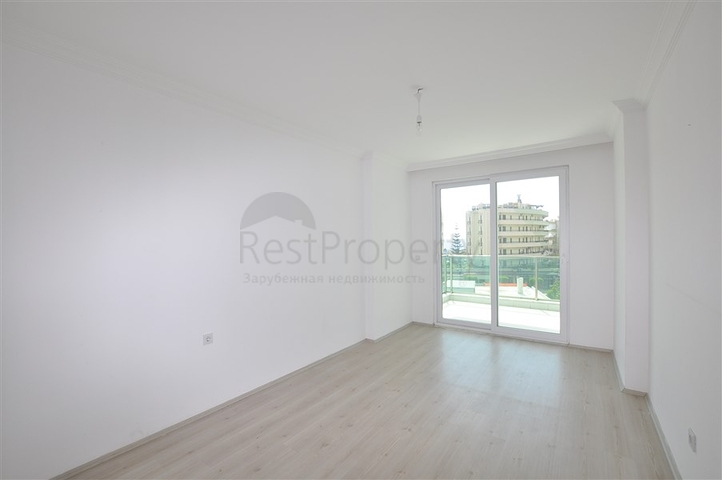 شقق للبيع في الانيا -تصميم 2 غرفة وصالة - ضمن مجمع قريب من البحر - في مهموتلار / الانيا 