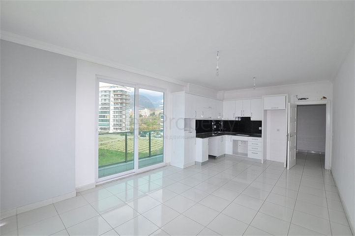 شقق للبيع في الانيا -تصميم 2 غرفة وصالة - ضمن مجمع قريب من البحر - في مهموتلار / الانيا 