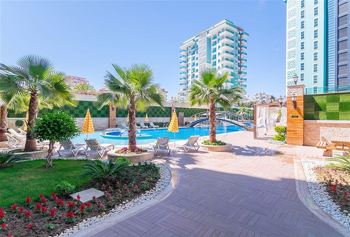 شقق للبيع في الانيا -تصميم 2 غرفة وصالة - ضمن مجمع قريب من البحر - في مهموتلار / الانيا 