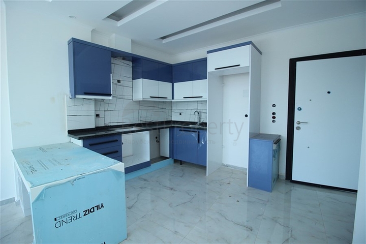 شقق حديثة للبيع في مهموتلار - تصميم 1+1 - ضمن مجمع سكني - مهموتلار/الانيا 