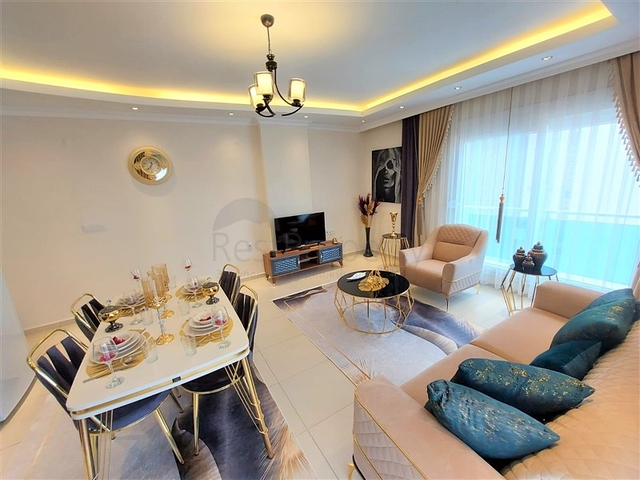 شقق حديثة للبيع في الانيا - تصميم 1+1 - قريبة من البحر - مهموتلار / الانيا 