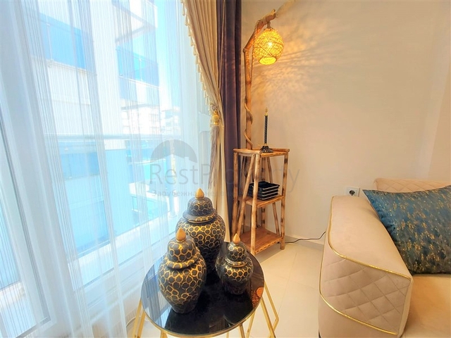 شقق حديثة للبيع في الانيا - تصميم 1+1 - قريبة من البحر - مهموتلار / الانيا 