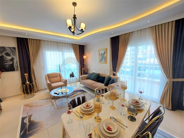 شقق حديثة للبيع في الانيا - تصميم 1+1 - قريبة من البحر - مهموتلار / الانيا 