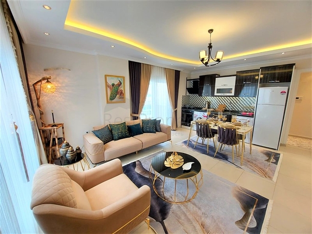 شقق حديثة للبيع في الانيا - تصميم 1+1 - قريبة من البحر - مهموتلار / الانيا 