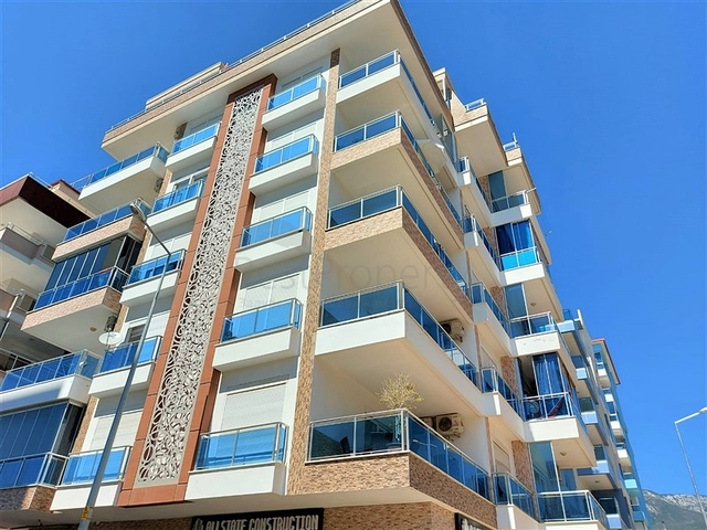 شقق حديثة للبيع في الانيا - تصميم 1+1 - قريبة من البحر - مهموتلار / الانيا 