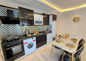 شقق حديثة للبيع في الانيا - تصميم 1+1 - قريبة من البحر - مهموتلار / الانيا 