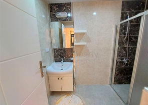 شقق حديثة للبيع في الانيا - تصميم 1+1 - قريبة من البحر - مهموتلار / الانيا 