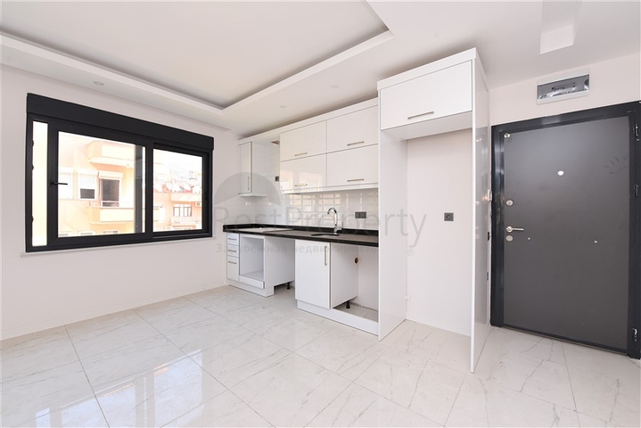 شقق للبيع في مركز الانيا - مجمع حديث -شقة  1+1 - الانيا 