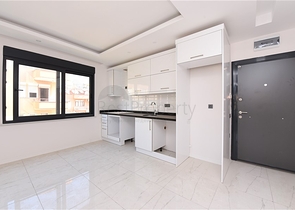 شقق للبيع في مركز الانيا - مجمع حديث -شقة  1+1 - الانيا 