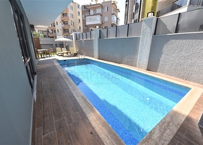 شقق للبيع في مركز الانيا - مجمع حديث -شقة  1+1 - الانيا 