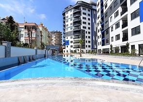 عقارت الانيا - شقة للبيع في مركز الانيا -مجمع حديث - تصميم 1+2 