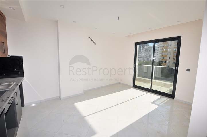 شقق في مهموتلار - تصميم غرفة وصالة -ضمن مجمع حديث فاخر -في محمودلار / الانيا 