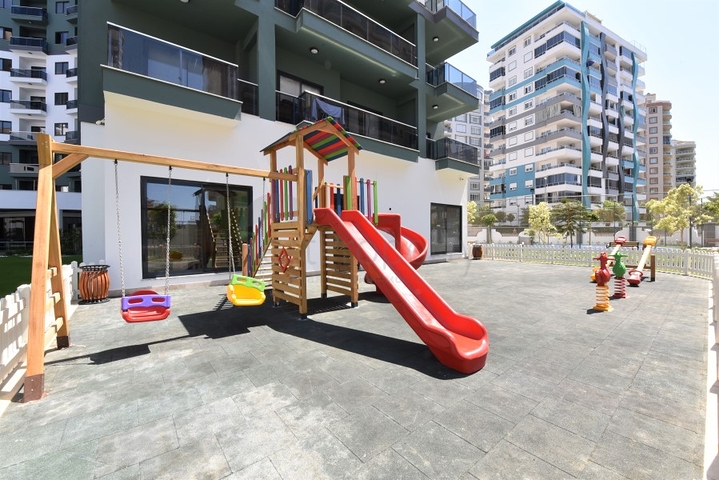 شقق في مهموتلار - تصميم غرفة وصالة -ضمن مجمع حديث فاخر -في محمودلار / الانيا 