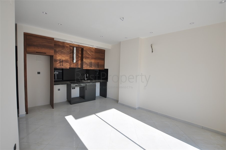 شقق في مهموتلار - تصميم غرفة وصالة -ضمن مجمع حديث فاخر -في محمودلار / الانيا 