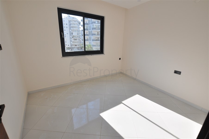 شقق في مهموتلار - تصميم غرفة وصالة -ضمن مجمع حديث فاخر -في محمودلار / الانيا 