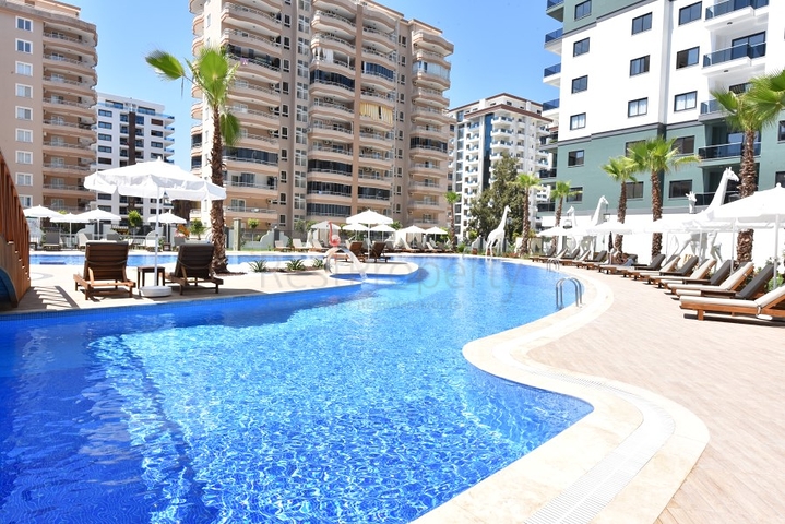 شقق في مهموتلار - تصميم غرفة وصالة -ضمن مجمع حديث فاخر -في محمودلار / الانيا 