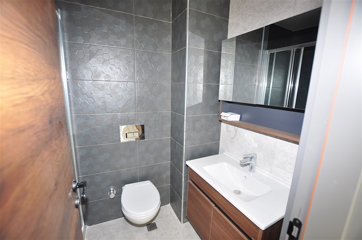 شقق في مهموتلار - تصميم غرفة وصالة -ضمن مجمع حديث فاخر -في محمودلار / الانيا 