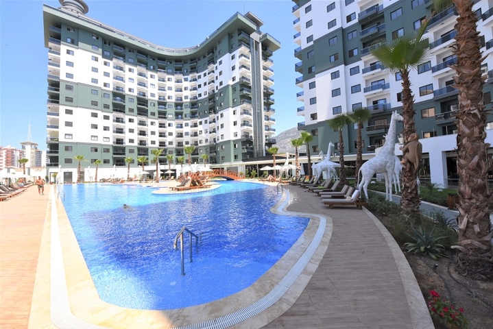 شقق في مهموتلار - تصميم غرفة وصالة -ضمن مجمع حديث فاخر -في محمودلار / الانيا 