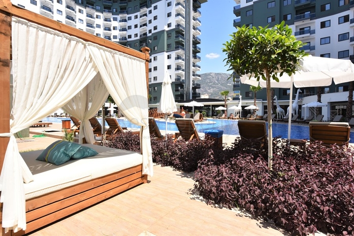 شقق في مهموتلار - تصميم غرفة وصالة -ضمن مجمع حديث فاخر -في محمودلار / الانيا 