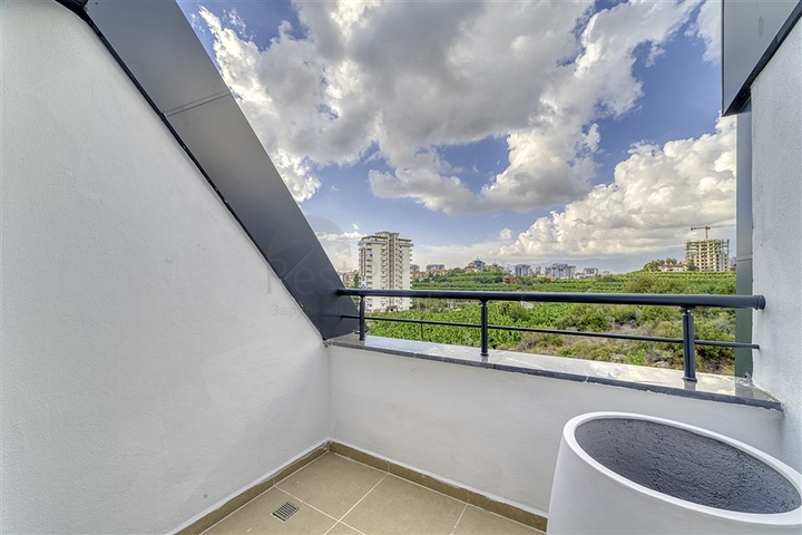 شقق بالتقسيط في  محمودلار - مجمع قيد الانشاء -مناسب للاستثمار .