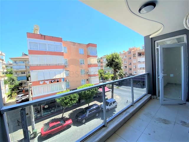 عقارات في الانيا - شقة جديدة من تصميم 1+1 - في مركز الانيا 