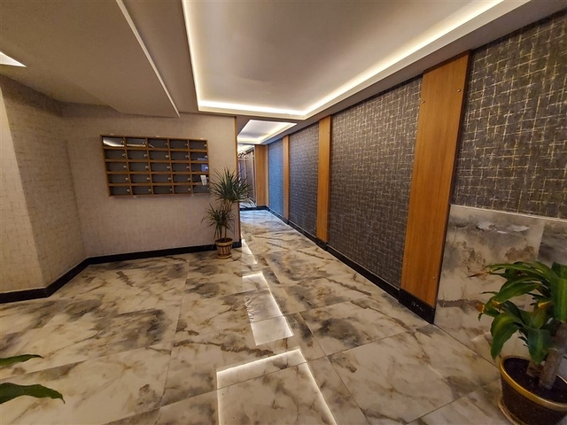 عقارات في الانيا - شقة جديدة من تصميم 1+1 - في مركز الانيا 