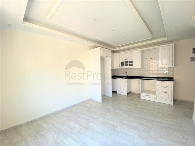 عقارات في الانيا - شقة جديدة من تصميم 1+1 - في مركز الانيا 