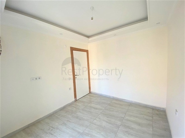 عقارات في الانيا - شقة جديدة من تصميم 1+1 - في مركز الانيا 