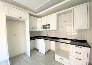 عقارات في الانيا - شقة جديدة من تصميم 1+1 - في مركز الانيا 