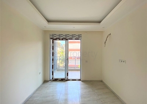 عقارات في الانيا - شقة جديدة من تصميم 1+1 - في مركز الانيا 