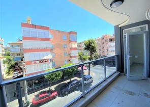 عقارات في الانيا - شقة جديدة من تصميم 1+1 - في مركز الانيا 