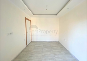 عقارات في الانيا - شقة جديدة من تصميم 1+1 - في مركز الانيا 