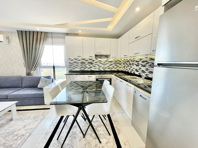 اطلالة بحرفي الانيا -شقة انيقة -تصميم 1+1 - في محمودلار / الانيا  