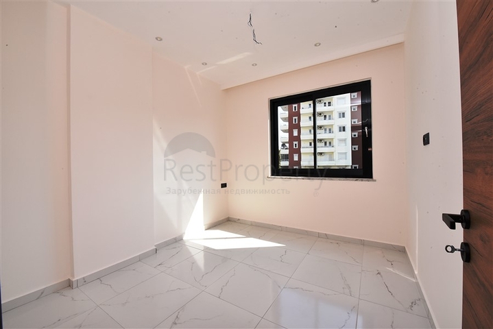 شقق للبيع في اوبا - تصميم غرفة وصالة -ضمن مجمع جديد -اوبا / الانيا 