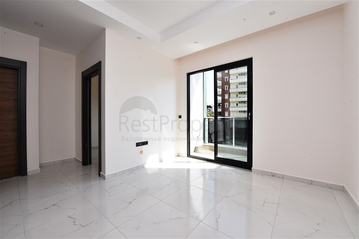 شقق للبيع في اوبا - تصميم غرفة وصالة -ضمن مجمع جديد -اوبا / الانيا 