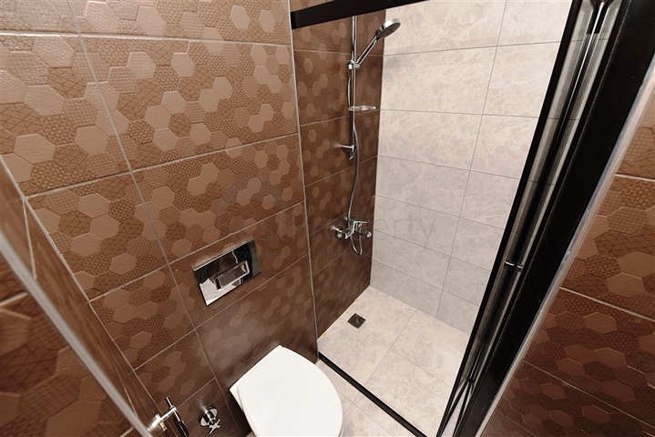 شقق للبيع في اوبا - تصميم غرفة وصالة -ضمن مجمع جديد -اوبا / الانيا 