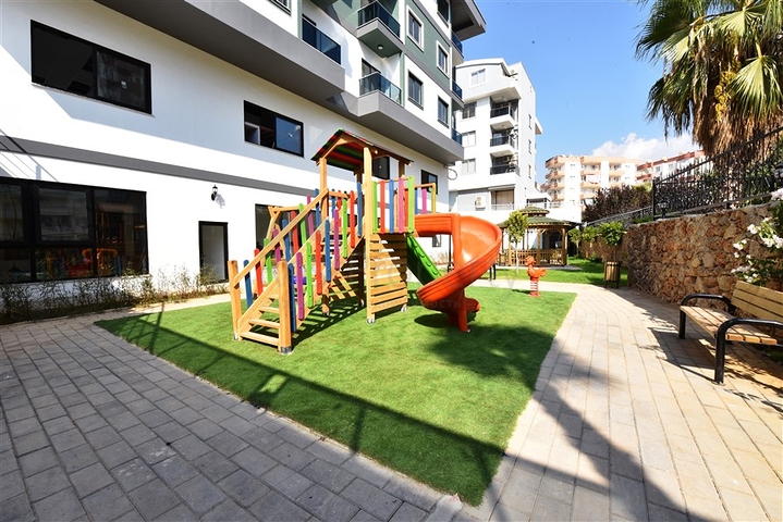 شقق للبيع في اوبا - تصميم غرفة وصالة -ضمن مجمع جديد -اوبا / الانيا 