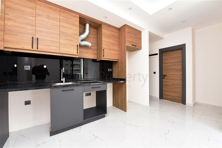 شقق للبيع في اوبا - تصميم غرفة وصالة -ضمن مجمع جديد -اوبا / الانيا 