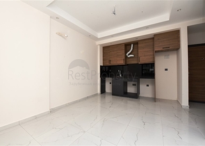 شقق للبيع في اوبا - تصميم غرفة وصالة -ضمن مجمع جديد -اوبا / الانيا 