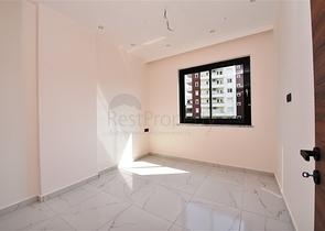 شقق للبيع في اوبا - تصميم غرفة وصالة -ضمن مجمع جديد -اوبا / الانيا 