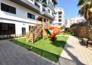 شقق للبيع في اوبا - تصميم غرفة وصالة -ضمن مجمع جديد -اوبا / الانيا 