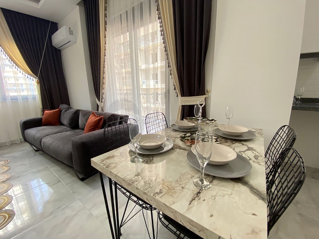 شقة جديدة في محمودلار - غرفة وصالة -موقع مركزي -في محمودلار / الانيا 