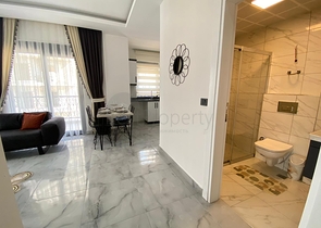 شقة جديدة في محمودلار - غرفة وصالة -موقع مركزي -في محمودلار / الانيا 