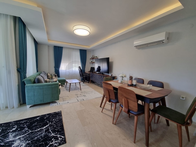 سعر منافس - شقة مؤثثة -طابق مرتفع - ضمن مجمع سكني في مهموتلار / الانيا 