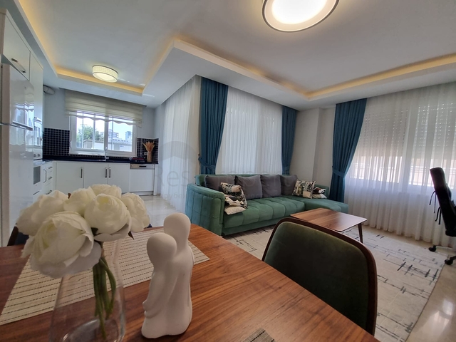 سعر منافس - شقة مؤثثة -طابق مرتفع - ضمن مجمع سكني في مهموتلار / الانيا 