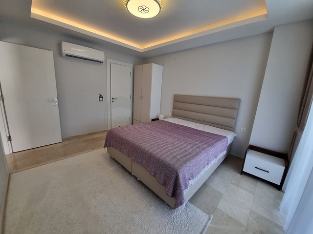 سعر منافس - شقة مؤثثة -طابق مرتفع - ضمن مجمع سكني في مهموتلار / الانيا 