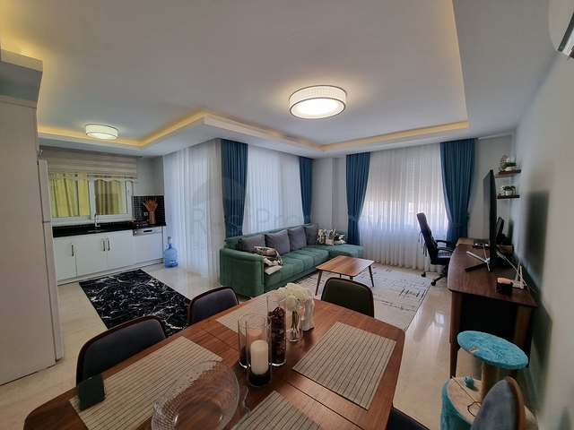 سعر منافس - شقة مؤثثة -طابق مرتفع - ضمن مجمع سكني في مهموتلار / الانيا 