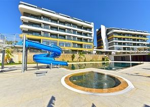 شقق 1+1 في مجمع قيد الإنشاء في منطقة أوبا