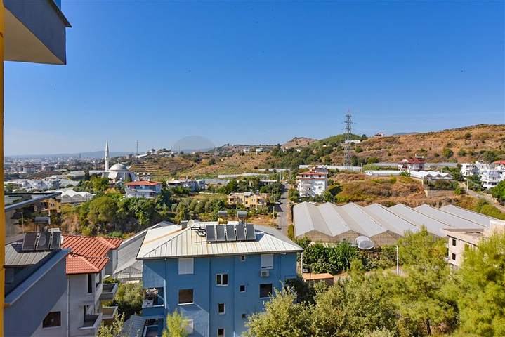 شقة 1+1 في منطقة كوناكلي في مجمع قيد الإنشاء